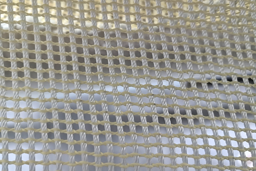 Vysoko pevný aramidom vystužený Mesh Fabric Roll – pre kompozitné základné materiály Vysoko pevný aramidom vystužený Mesh Fabric Roll – pre kompozitné základné materiály